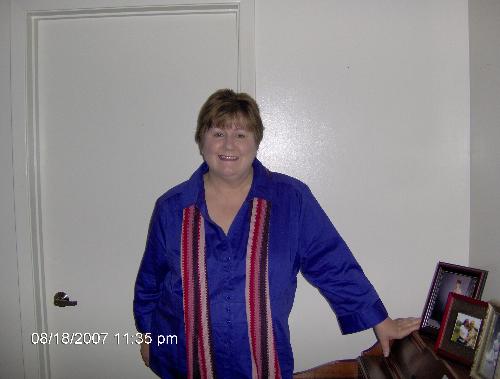 Kay in purple -08 - I am 57 years old, divorced, have two sons and two grandchildren. I also have a variety of interest such as music, karoke, movies, computers, animals, religion and medical. I also have a dog named Kandi. She is a white poodle and is a lot of company. I never feel alone when she is around. I work from home via computer as a medical transcriptionist. Also, I am a nurse, but not practicing at this time. If you are interested in any of these subjects, I would love to talk to you.