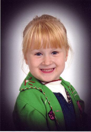 Kaitlyn in Grandma's mexican jacket - This is my daughter in her Grandma Helen's mexican jacket that her aunt gave her when she was Kaitlyn's age.