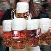 Mugs of frothing beer ! - This picture shows mugs of frothing beer. Attractive and desirable on a hot day!