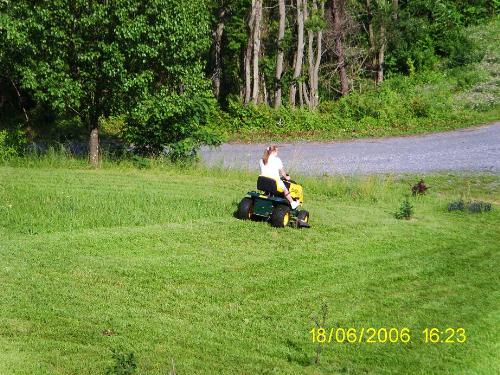 Hot Mamma on a Mean Rider Mower - Yeah, that's right... don't mess with me! I tell that grass who's boss!