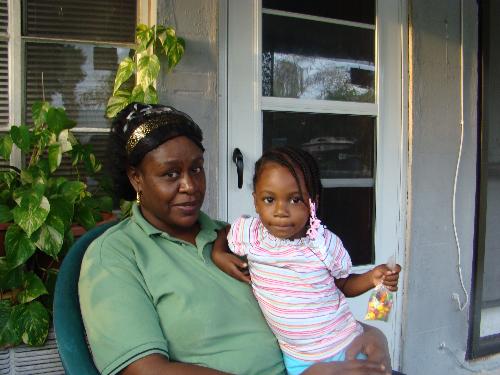 Old neighbor and granddaughter - This is a picture of my neighbor before I moved . She is holding her grand daughter. She is a really sweet lady.