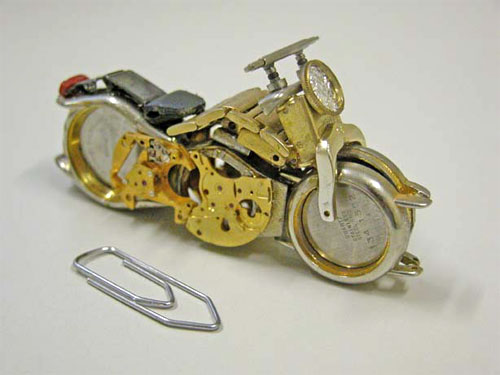 Watch - This miniature model of bike is completely made from a parts of used watches..