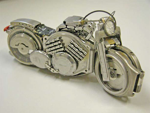 Wrist watch parts - this miniature model of bike is completely made from a parts of used wrist watches..