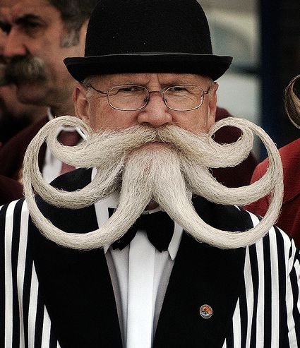 Old and Weird - Born, live, get old, get weird, and die. LOL This is a photo of an old man with a weird but fancy beard and mustache.