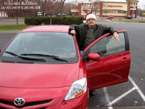 Yeah, it's me! - Me and my small red ugly foriegn beast of a rental car.
