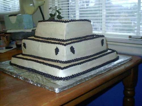 here is a photograph of a wedding cake that i desi - here is a photograph of a wedding cake that i designed and delivered today! what do you-all think of it?
