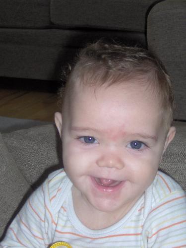 Alexander - My smiling handsome son :-) Only 9 months an already a charmer.