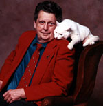 Cleveland Amory with his cat Polar Bear - Cleveland Amory, prominent humorist and humanitarian, founded The Fund for Animals in 1967 and served without pay as its president until his death on October 15, 1998, at the age of 81. He is buried next to his beloved Polar Bear, at Black Beauty Ranch in Texas.