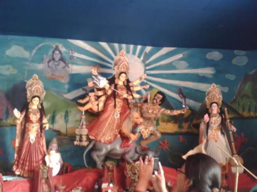 The goddess Durga - The goddess Durga is the image of prosperety.The Hindus worship goddess Durga in the Autumn.The goddess Duga killed the demon and saved the mankind.