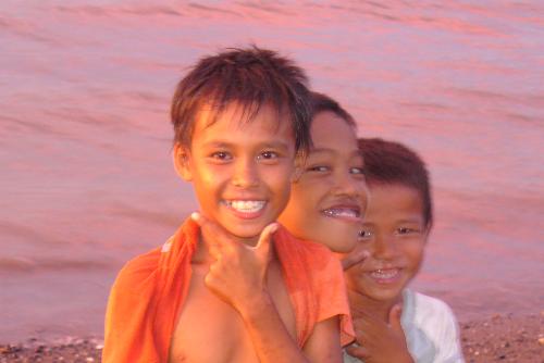 Boys Smile - what ever difficulties in life their still huge smile, look at that kids they are poor and they live in an urban place but they are happy and sometimes they don't eat a right food or the normal eating habbits three times a day.