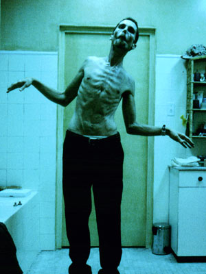 Bale Machinist - He looks like a zombie from some horror film:)