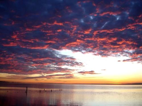 Sunset with clouds - Clouds taking on colour at sunset