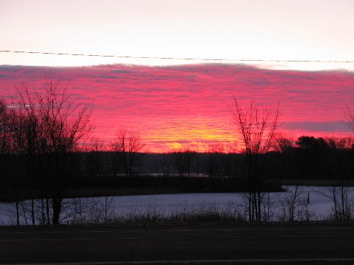 Sunrise over the Bay - This photo was taken with my Canon G9 on my way to work. The only change was to resize it to fit on mylot.