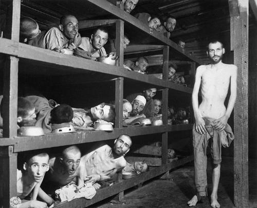 world war 2 - These are slave labors in the Buchenwald concentration, many had died from malnutrition when US troops entered the camp..