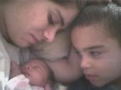 a mothers love - my son and daughter, 4 days after her birth. Wow can you love someone anymore than the love for your children