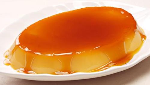 Leche Flan - Egg and milk custard, topped with brown sugar caramel. A favorite dessert, and ever-present during Christmas!