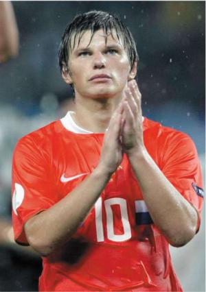 Arshavin - Arshavin after the washout Russia vs. Spain match in the UEFA 2008.   Arshavin was a marked man and Puyol was never going to give him any space. It was a shadow of the side who had beaten the Dutch so convincingly. Hiddink looked helpless but he and his team should be credited for getting so far in the tournament and making some stars out of Arshavin, Pavlyuchenko, and Zhirkov. Yey for Russia! =P