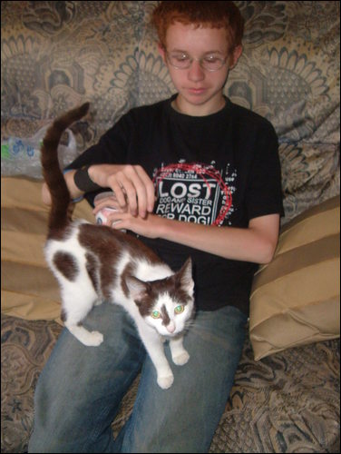 My eldest son with our old cat Skye - My eldest and Skye