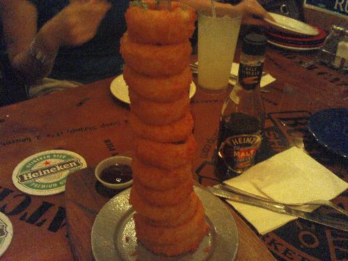Bubba Gump Shrimp Onion Rings - Comes in a tower :)  Doesn't fall over.. The onion rings are stacked onto a metal(??) rod tower..