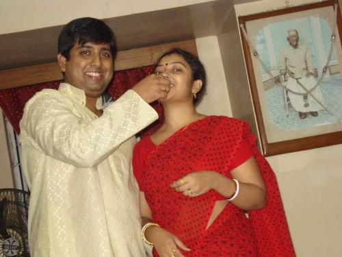 happy couple.. - taking sweets..