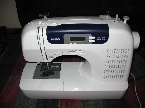 my newest sewing machine  - IT'S BY BROTHER CS-6000i. Got it for a Christmas present.