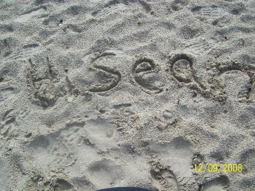 My message in the sand - In September, I went to the south of France to visit my mum. No matter how much I told my fiancee to get his passport done or got him the forms, he still hadn't got it sorted so I had to go to France on my own. I really missed Sean while I was out there so I did a message in the sand so that he knew I was thinking of him.
