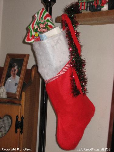 Stockings Stuffed - One of the grandkids stockings stuffed and hung with care waiting for the BIG DAY! Stockings Stuffed - One of the grandkids stockings stuffed and hung with care waiting for the BIG DAY!