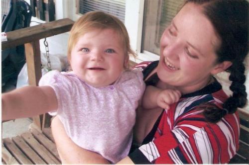 Me and my daughter - Me and my daughter Haley swinging at my moms old house.
