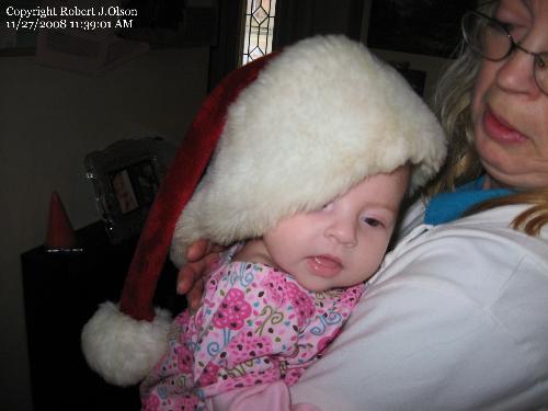 Santa Savanna - My grand daughter wearing my Santa hat on Thanksgiving day 2008.