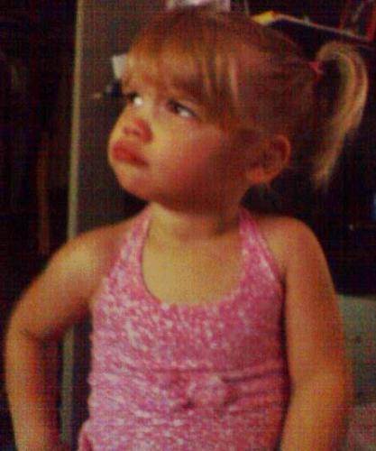 kiddo - my 2 year old making a silly little face. :D