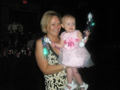 Me and my cousins baby - Dancing with my cousins baby at my brothers wedding this past summer!!!