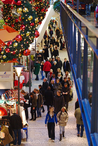 Christmas Holiday Shopping - Photo of people doing their Christmas holiday shopping in a mall.
