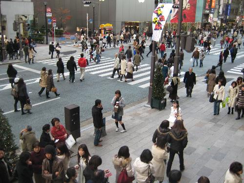 People walking at Ginza Tokyo Japan - Many people walking on the street at Ginza Tokyo Japan