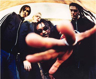 Skindred - The members of Skindred. Vocalist Benji Webbe, guitarist Mikey Dee, bassist Daniel Pugsley and drummer Dirty Arya. I think they blend together so well to form a reggae metal like fusion band.