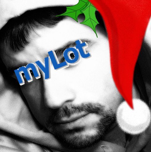 myLot as Santa Claus - HO HO HO, a photo of a man with a Santa Claus hat and a myLot logo eyes.