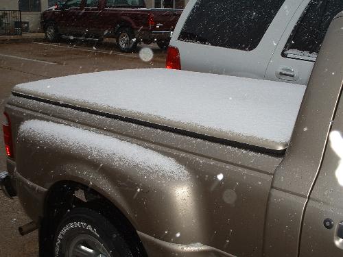 snow falling on the truck here, my picturein the p - snow falling on the truck here, my picture in the parking lot