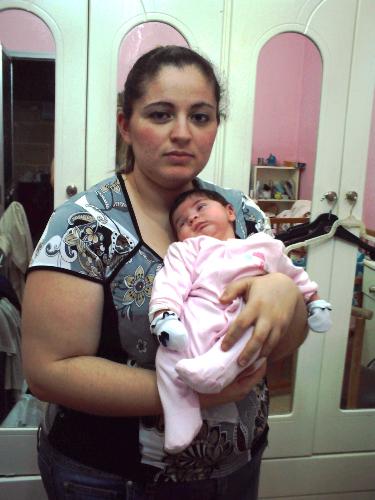 me and marahia - my little girl and me at my house.she's only few days old