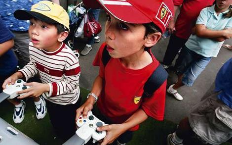 addicted to video games - siblings playing a video game in a xbox.