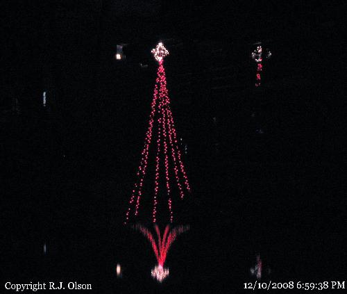 Tall Tree Decoration - This is on a flag pole and looks awesome reflected in the creeks water.