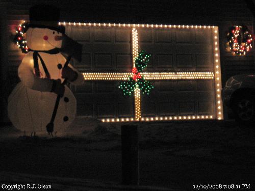 Garage Door Decorated - I have always loved this houses decorations for the Holiday Season.