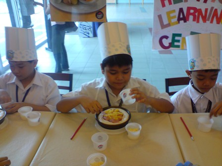 my son - pizza making at Pizza Hut - at Pizza Hut...