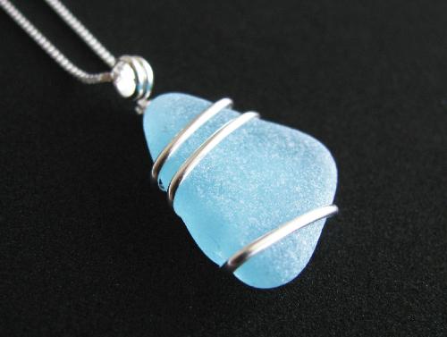 Soft Aqua Sea Glass Necklace - One of the prettiest aqua blue pieces of sea glass I've ever had! This well-weathered and truly flawless piece of sea glass make this necklace a head-turner. The images don't do this necklace justice.  The ocean gem is approx 7/8' in length, wire-wrapped with sterling silver wire and dangles on an 18' sterling silver box-style chain. Currently in my Etsy shop