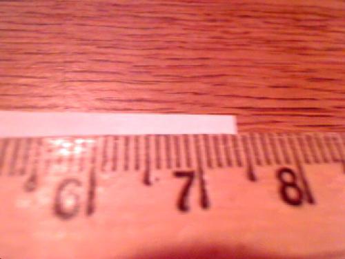 Measuring fiances ring - Here is a picture of the white paper I used to measure his ring finger. I am wondering precisely how many inches is this?