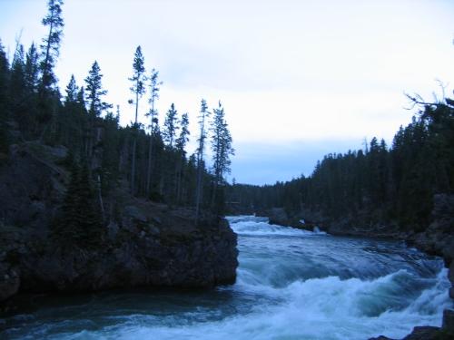 river - River coming through hill side.