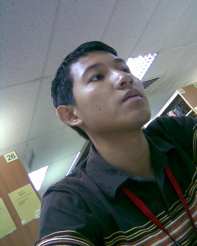 its me - the photo was taken in my college's library. i was bored waiting for my friend, so i took the pic.