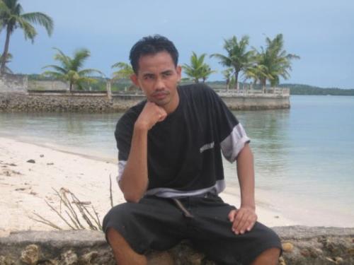 Alone on Th Beach - We were on the beach at San Remigio, Cebu Philippines. That picture was taken during our acquaintance party Year 2008.