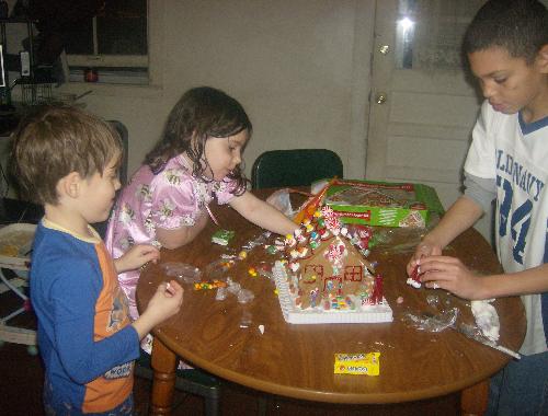 gingerbread house - The kids making a gingerbread house gingerbread house - The kids making a gingerbread house