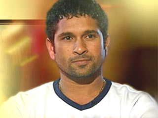 Sachin posing to camera - Sachin in an interview