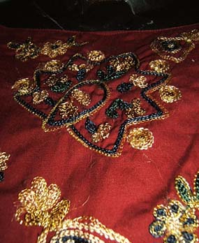 Red fabric with beading - Lovely red east indian fabric with beading.