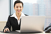 woman working - photo of woman working on computer